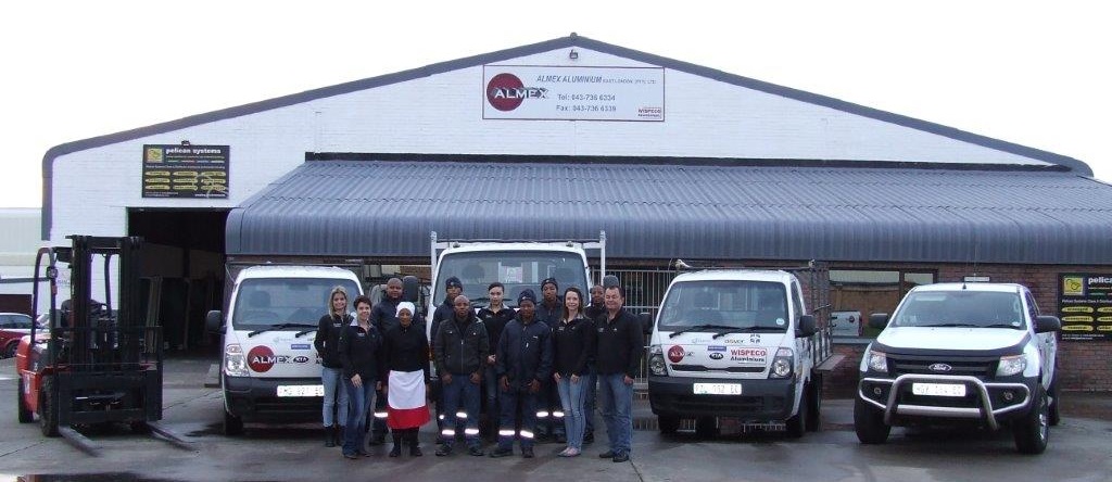 The Almex Team in front of their building